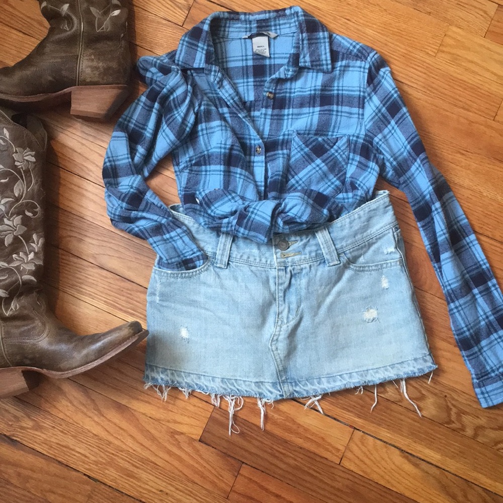 Distressed denim mini skirt